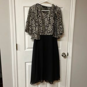 Gabby Skye Occasions knee length dress. Black and silver , size 10
